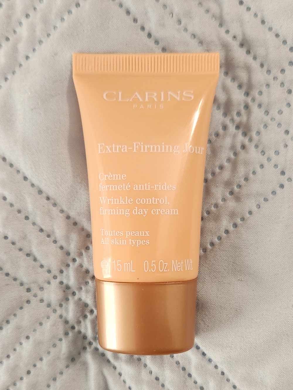 Clarins Extra-Firming Jour Day Cream Tube in Peach and Gold